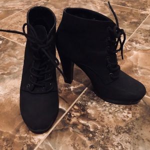 Black heeled boots with laces